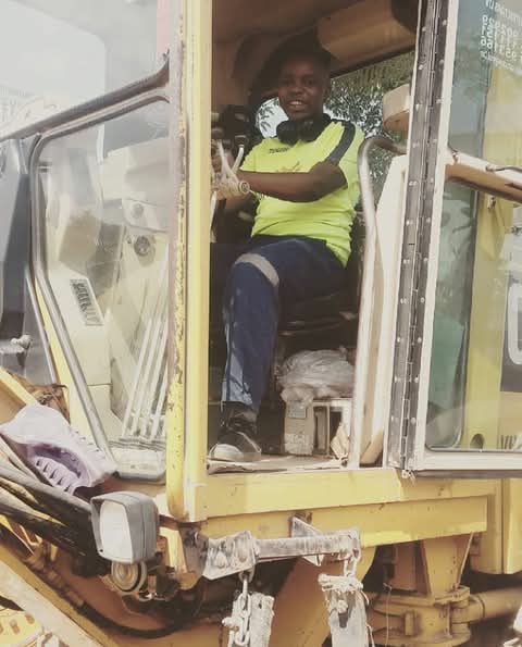 Darwin Chapuswike in Lusaka inside a Grader, at 20 years old