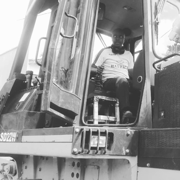 Person operating heavy machinery, a metaphor for taking control